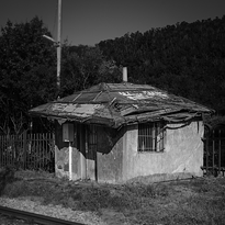 Tiny house by the railway. Title photograph of the gallery Diaries XXXIX.