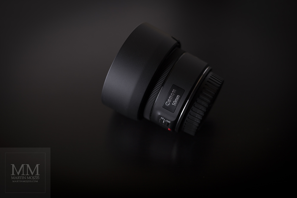 Canon EF 50 mm 1:1.8 STM. Top view with a lens hood.