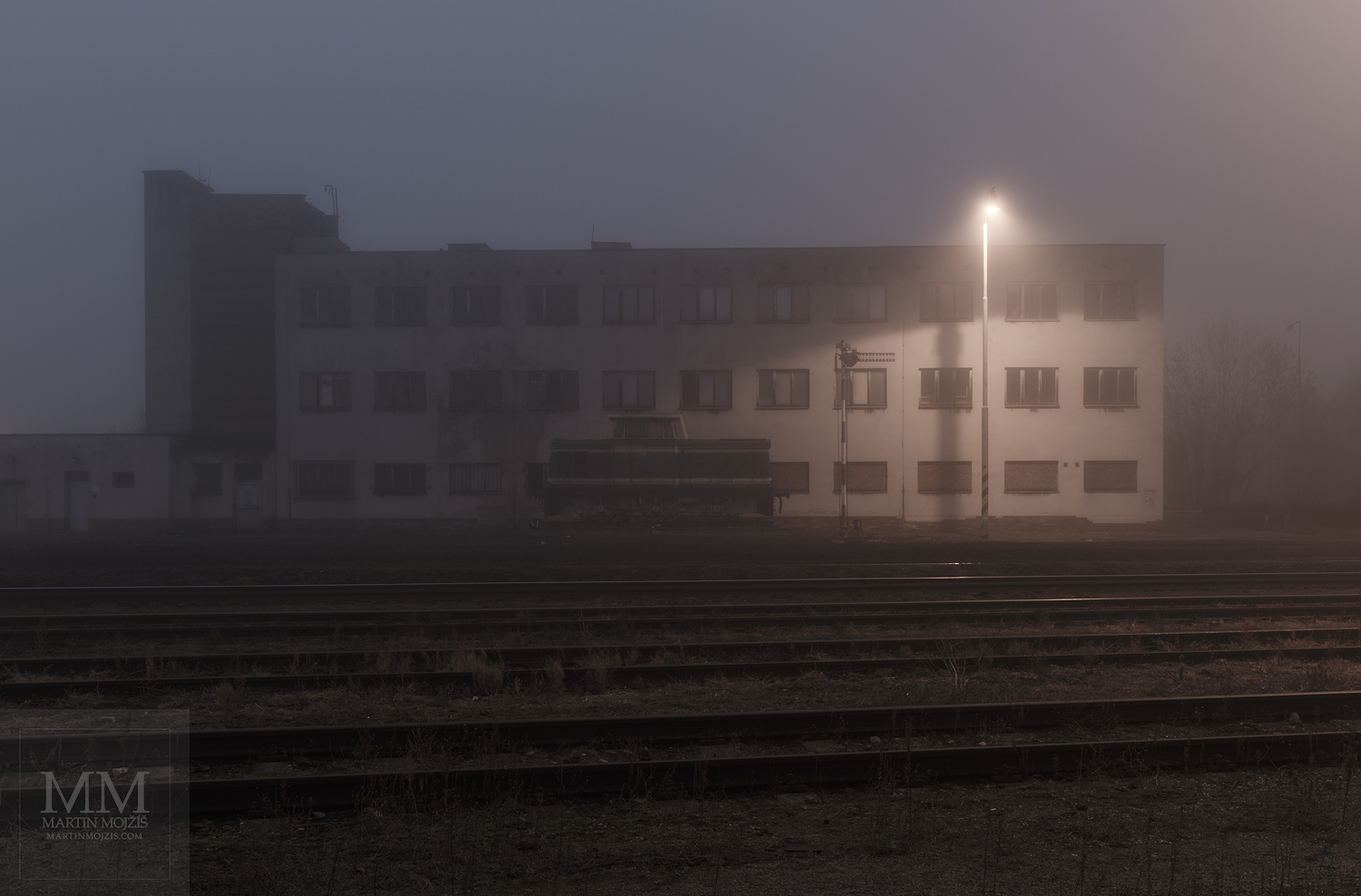 Large format, fine art photograph of railway station in fog. Martin Mojzis.