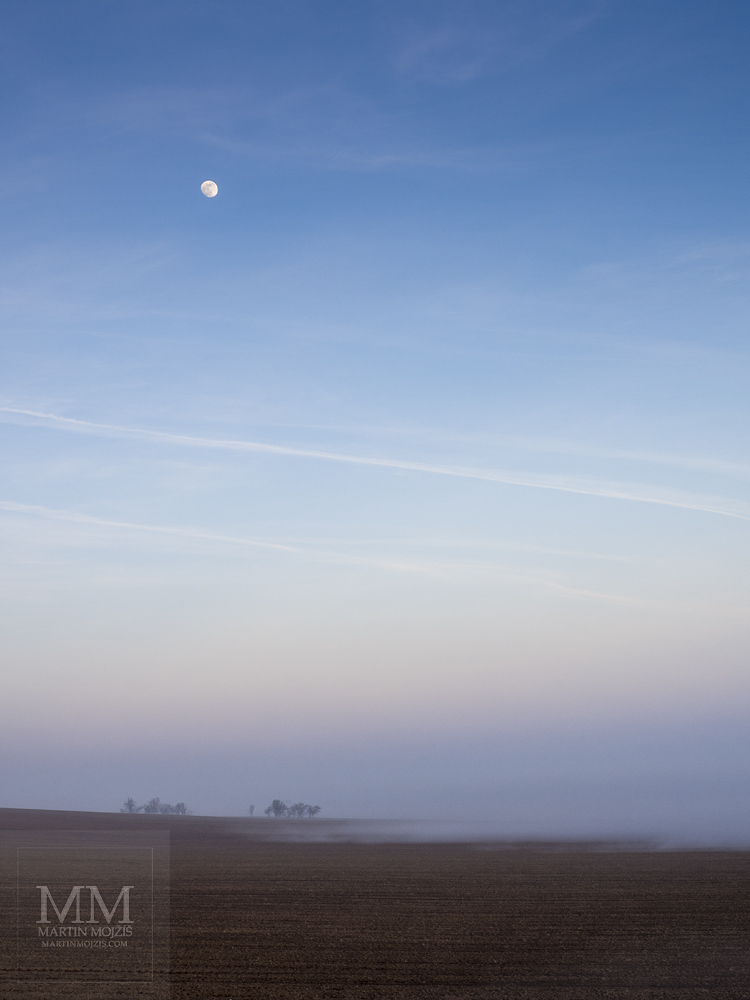Large format Fine Art photograph of late evening foggy landscape.
