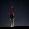 Large format Fine Art photograph of night landscape with starry heaven and large transmitter tower. Martin Mojzis.