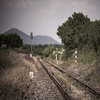 A railway track in a landscape.