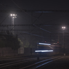A locomotive running on a night track.